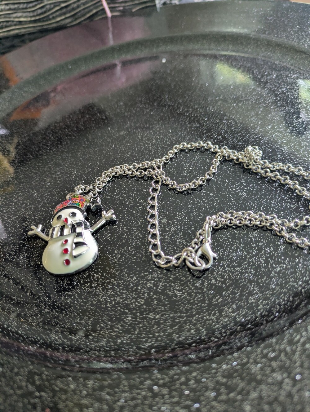 57. Snowman Necklace ($5/3for12/Freewith$50purchase)